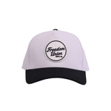 White snapback cap with black visor and Freedom Union logo patch