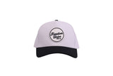 White snapback cap with black visor and Freedom Union logo patch