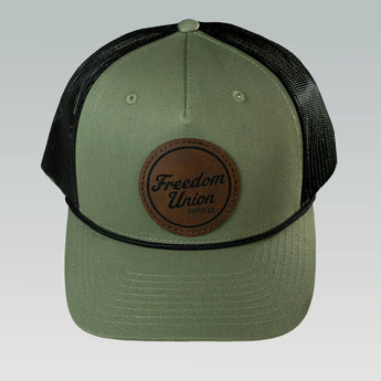 Green and black snapback hat with mesh back and Freedom Union logo patch