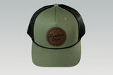 Green and black snapback hat with mesh back and Freedom Union logo patch