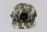 Camouflage-patterned cap with 'Freedom Union' logo on a light gray background