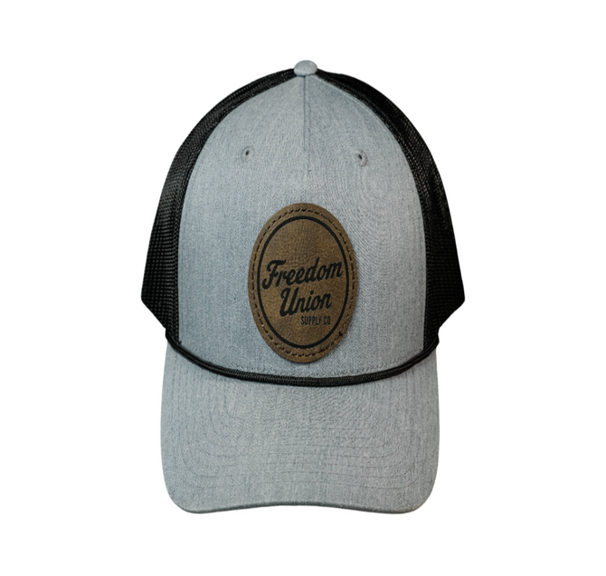 Gray and black cap with a brown leather patch featuring 'Freedom Union' on a white background