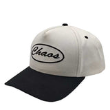 White and black cap with “Chaos” embroidered on the front panel