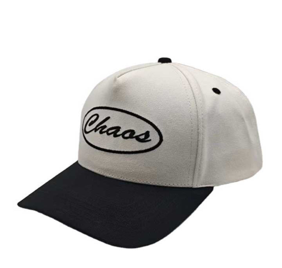 White and black cap with “Chaos” embroidered on the front panel
