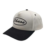 White and black cap with “Chaos” embroidered on the front panel