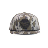 Camo snapback hat with circular black Freedom Union logo patch