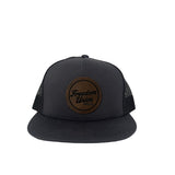 Gray and black snapback hat with mesh back and leather-look Freedom Union patch