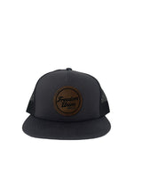 Gray and black snapback hat with mesh back and leather-look Freedom Union patch