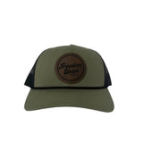 Green and black snapback hat with mesh back and Freedom Union logo patch