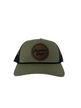 Green and black snapback hat with mesh back and Freedom Union logo patch