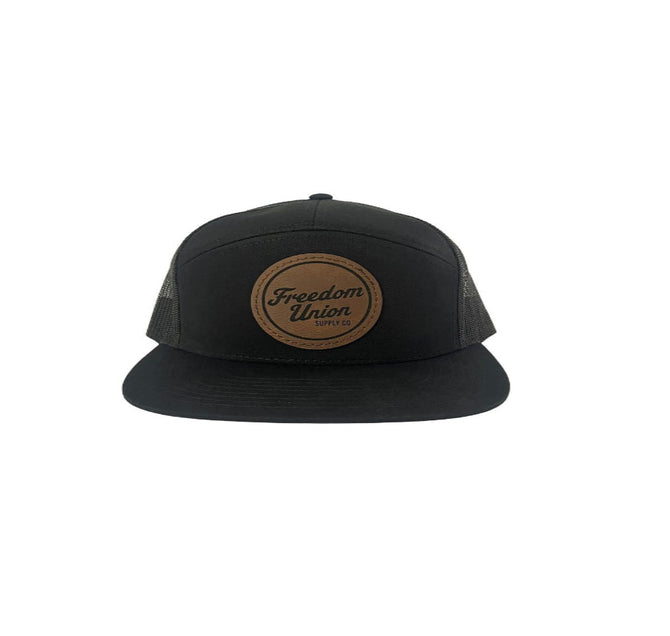 Youth black trucker snapback hat with mesh back and logo patch