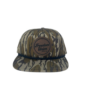 Vintage camo snapback hat with Freedom Union logo patch